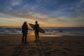 Dawn Surf Persons Silhouetted Royalty Free Stock Photo