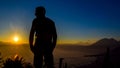 Dawn views of Lake Atitlan and hiker from the heights of Indian Nose pointview