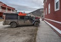 Muddy Jeep on a Street in Dawson City