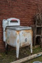 Dawsonville, Georgia USA - October 24, 2015 Antique Maytag washer from the 1940s or 1950s sitting outdoors