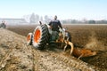 Day annual plowing with vintage tractors. Royalty Free Stock Photo