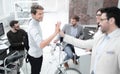 Day without a car.business colleagues giving each other a high five. Royalty Free Stock Photo