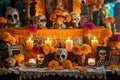 day of the dead altar with marigolds and skulls