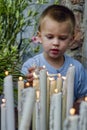 day of the dead, boy lighting candles Royalty Free Stock Photo