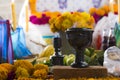 Day of the dead, colorful mexican altar and ceramic cup for copal and incense for offerings