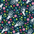 Day of the Dead skeleton hand and flower seamless pattern on green background. Dia De Los Muertos celebration