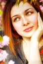 Day dreaming pensive woman and spring flowers Royalty Free Stock Photo