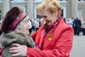 Day of the elderly person in Russia, two familiar yellow women on the street