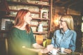 Day for gossip. Women at cafe.