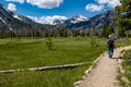 Day hiker follows a trail into the mountains of Idaho