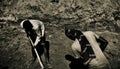 Day labourers working together around a street project Royalty Free Stock Photo