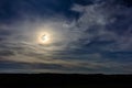 A wonderful full moon has descended over Ukrainian carpathians in blurry clouds