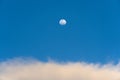 Day moon and strange clouds on the sky Royalty Free Stock Photo