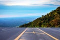 The highway leads to the mountains in the morning