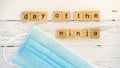 Day of the Ninja.words from wooden cubes with letters photo Royalty Free Stock Photo