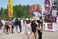 attractions families mothers with children strollers tourists backpacks beautiful sunny day hats Cloverdale rodeo Royalty Free Stock Photo