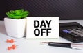 Day Off text quote on notepad, concept background Royalty Free Stock Photo