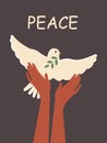 International Day of Peace. White dove in female hands on a black vertical poster. Peace to Ukraine. Royalty Free Stock Photo