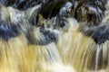 Tannins turn a waterfall amber in Colchester, Connecticut in autumn