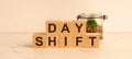 Day shift words on wooden blocks. day shift concept