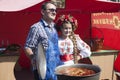 Day of Sloviansk. Mayor Vadim M. Lyakh at the Sloviansk Cathedral Square as a chef photographed with an unknown girl in Ukrainian