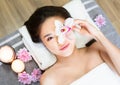 Day at spa. Beautiful asian lady having spa, massage and aromatherapy session. Royalty Free Stock Photo