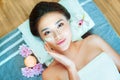 Beautiful asian lady having spa, massage and aromatherapy session. Royalty Free Stock Photo