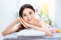 Beautiful asian lady having spa session, massage and aromatherapy session. Pretty korean young woman portrait at massage parlor Royalty Free Stock Photo