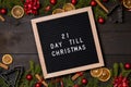 21 Day till Christmas countdown letter board on dark rustic wood Royalty Free Stock Photo