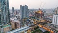 Day to night holy grail time-lapse of construction site and traffic in city. Advanced building technology, city life concept