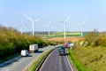 Day view UK Motorway Road Wind Turbines Royalty Free Stock Photo
