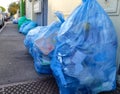 Day withdrawal of the bags with plastic. Separate collection for recycling in Italy