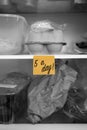 5 a day written on a sticky note stuck on a fridge shelf with food Royalty Free Stock Photo