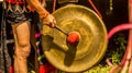 Dayak male hit the gong