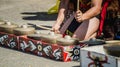 Dayak traditional tribe of Borneo artists playing gong / traditional percussion instrument