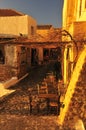 Daybreak painting part of the old town of Monemvasia in golden hues
