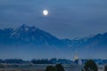 Daybreak Utah at night with bright moon in the sky