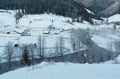 Daybreak winter Carpathian mountain village Zelene, Verkhovyna, Royalty Free Stock Photo