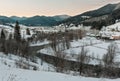 Daybreak winter Carpathian mountain village Zelene, Verkhovyna, Royalty Free Stock Photo