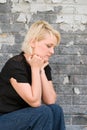 Blond Woman Daydreaming with Chin on Hands Royalty Free Stock Photo