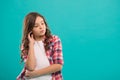 Daydreaming concept. Kid thoughtful face make decision. Child cute curly hair thinking. Girl casual look make hard Royalty Free Stock Photo