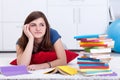 Daydreaming by the school books Royalty Free Stock Photo