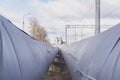 Daylight. Metal pipes covered with a special insulation to reduce heat loss. heating main Royalty Free Stock Photo