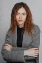 Portrait of pale model with red hair and fresh natural make up