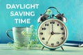 Daylight Saving Time concept, spring forward. A retro alarm clock Royalty Free Stock Photo