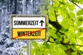 Daylight saving time. DST. Zeitumstellung von Winterzeit auf Sommerzeit Schild. Royalty Free Stock Photo