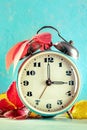 Daylight Savings Time concept, fall back in autumn. A vintage alarm clock Royalty Free Stock Photo