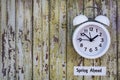 Daylight Savings Time Spring Ahead concept top down view with white clock Royalty Free Stock Photo