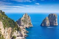 Daylight view of famous Faraglioni Rocks, Capri Island, Italy Royalty Free Stock Photo