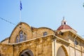 Daylight view to Faneromeni Church roof with greek flag